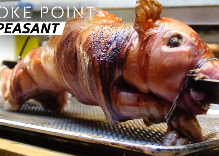 How NYC’s Peasant Prepares a Suckling Pig Over a Wood Fire