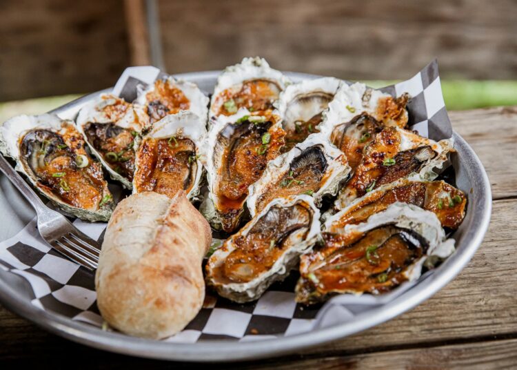 Drive, Ferry, or Swim If You Must to Reach Washington State’s Outdoor Oyster Saloon